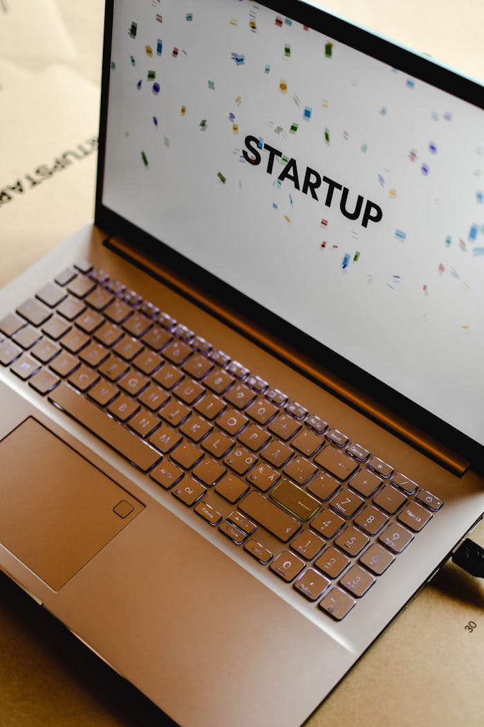 Close-up of a laptop screen displaying the word STARTUP, ideal for business and tech themes.